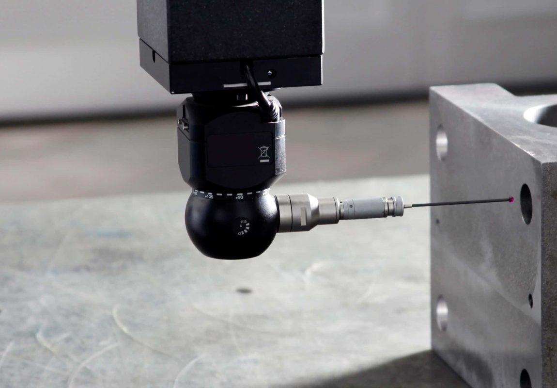 CMM inspection of precision machined component for quality control in UK engineering facility